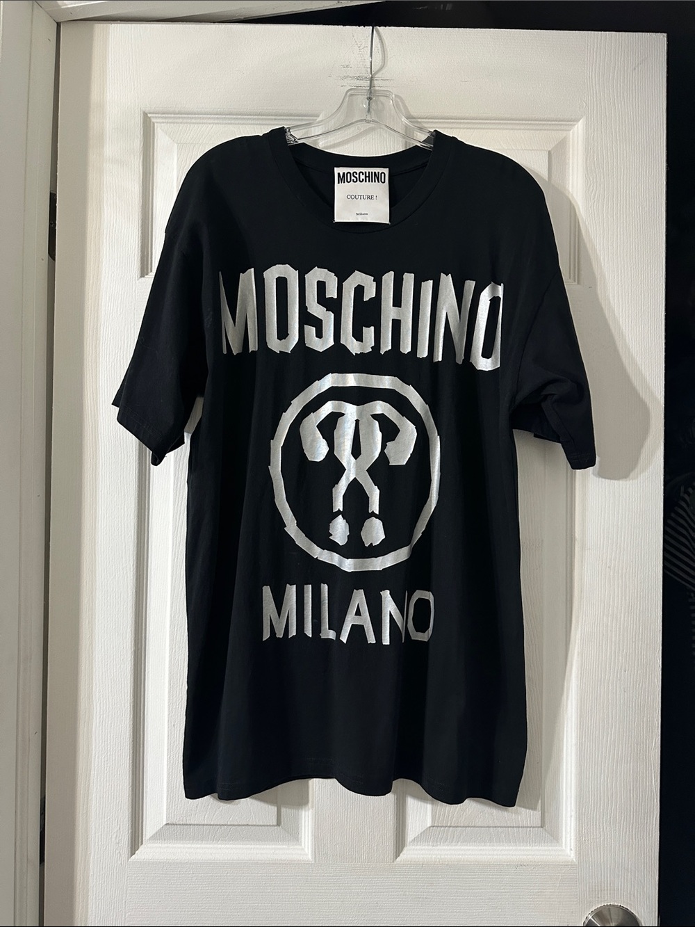 Moschino Black T-Shirt with Silver Logo Print. Run  big